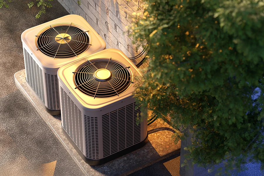 two outdoor home air conditioning units